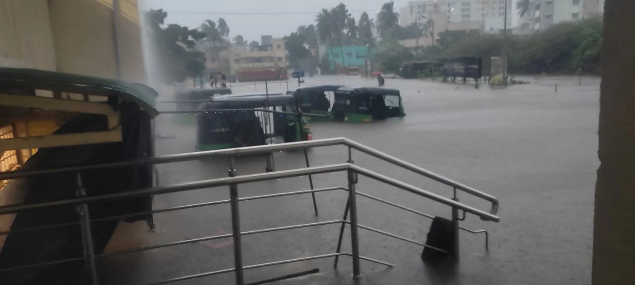 Leggo autos submerged in floodwater outside a building