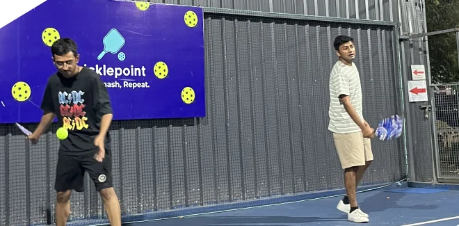 The team playing pickleball after work
